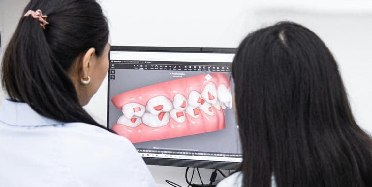 Clinicians reviewing a digital treatment plan together