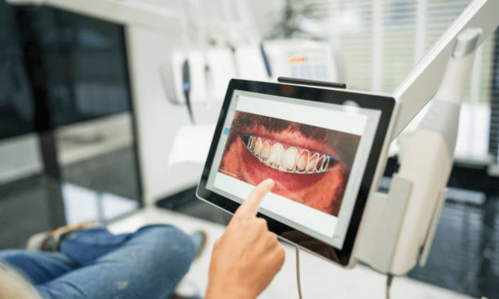 Clinician reviewing a digital treatment plan chairside